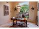 Home office featuring a large window and rustic wooden desk at 14521 E Desert Vista Trl, Scottsdale, AZ 85262