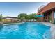 Inviting pool with waterfall feature and lounge chairs, perfect for relaxation at 14521 E Desert Vista Trl, Scottsdale, AZ 85262