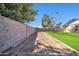 Large backyard with grassy area and block wall at 14821 N 60Th Dr, Glendale, AZ 85306