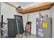 Unfinished basement with water heater and shelving at 14821 N 60Th Dr, Glendale, AZ 85306