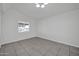 Simple dining area with tile floors and a window at 14821 N 60Th Dr, Glendale, AZ 85306