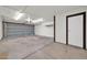 Spacious garage with overhead door and ample space at 14821 N 60Th Dr, Glendale, AZ 85306