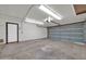 Spacious garage with overhead door and ample space at 14821 N 60Th Dr, Glendale, AZ 85306