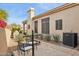 Landscaped backyard with patio and AC unit at 15548 E Jojoba Ln, Fountain Hills, AZ 85268