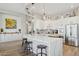 Modern kitchen with white cabinets, quartz countertops and island at 15548 E Jojoba Ln, Fountain Hills, AZ 85268