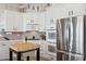 Modern kitchen with stainless steel appliances and white cabinetry at 15548 E Jojoba Ln, Fountain Hills, AZ 85268