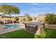 Inviting backyard with a pool and hot tub at 15548 E Jojoba Ln, Fountain Hills, AZ 85268