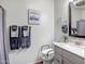 Bathroom features a large vanity with marble countertop, toilet, and shower at 16224 W La Ventilla Way, Goodyear, AZ 85338