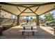 Covered gazebo with picnic tables, near playground at 16224 W La Ventilla Way, Goodyear, AZ 85338