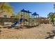 Community playground with climbing structures and slide at 16224 W La Ventilla Way, Goodyear, AZ 85338