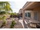 Covered patio with table and chairs, small garden at 16225 N 22Nd Dr, Phoenix, AZ 85023