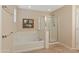 Bathroom with bathtub and walk-in shower at 16225 N 22Nd Dr, Phoenix, AZ 85023