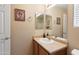 Bathroom with single vanity, oval sink, and shower/tub combo at 16225 N 22Nd Dr, Phoenix, AZ 85023