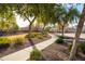 Curved path through a landscaped community area at 16225 N 22Nd Dr, Phoenix, AZ 85023