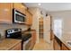 Kitchen with stainless steel appliances and ample cabinetry at 16225 N 22Nd Dr, Phoenix, AZ 85023