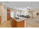 Kitchen with island, stainless steel appliances, and wood cabinets at 16225 N 22Nd Dr, Phoenix, AZ 85023