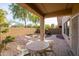 Cozy patio with table and chairs, perfect for relaxing at 16225 N 22Nd Dr, Phoenix, AZ 85023