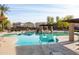 Community pool with relaxing seating and shade structures at 16225 N 22Nd Dr, Phoenix, AZ 85023