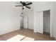 Bedroom with ample closet space and ceiling fan at 1743 W Verde Ln, Phoenix, AZ 85015