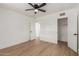 Light and airy bedroom with wood flooring and closet at 1743 W Verde Ln, Phoenix, AZ 85015