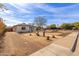 Newly renovated home with a spacious front yard and drought-tolerant landscaping at 1743 W Verde Ln, Phoenix, AZ 85015