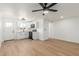 Modern kitchen with white cabinets and appliances at 1743 W Verde Ln, Phoenix, AZ 85015