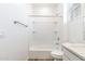 Clean bathroom with a shower/tub combo and white vanity at 17826 W Sanna St, Waddell, AZ 85355