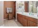 Double vanity bathroom with large mirror and shower at 1825 N Lewis Pl, Casa Grande, AZ 85122