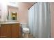 Clean bathroom with shower/tub combo, toilet and vanity at 18489 N Davis Dr, Maricopa, AZ 85138