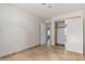 Bright bedroom with tile floors and mirrored closet doors at 19037 N 73Rd Ln, Glendale, AZ 85308