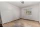 Small bedroom with tile flooring at 19037 N 73Rd Ln, Glendale, AZ 85308