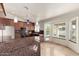 Spacious kitchen with granite countertops and stainless steel appliances at 19037 N 73Rd Ln, Glendale, AZ 85308