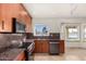 Kitchen with granite countertops and stainless steel appliances at 19037 N 73Rd Ln, Glendale, AZ 85308