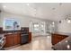 Kitchen with granite countertops and dark wood cabinets at 19037 N 73Rd Ln, Glendale, AZ 85308