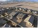 Aerial view of neighborhood with mountain views at 20249 W Woodlands Ave, Buckeye, AZ 85326