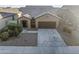 Aerial view of house and driveway at 20249 W Woodlands Ave, Buckeye, AZ 85326