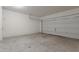 Spacious garage with open overhead door at 20249 W Woodlands Ave, Buckeye, AZ 85326