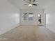 Main bedroom with door leading to backyard at 20249 W Woodlands Ave, Buckeye, AZ 85326