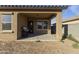 Covered patio with built-in grill at 20249 W Woodlands Ave, Buckeye, AZ 85326