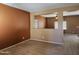 Living room with neutral walls and carpeting at 20356 N 261St Dr, Buckeye, AZ 85396