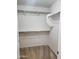 Large walk-in closet with double hanging rods at 20356 N 261St Dr, Buckeye, AZ 85396