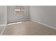 Well lit bedroom showcasing modern flooring and neutral wall paint at 21537 W Pierson St, Buckeye, AZ 85396
