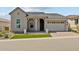 Charming single-Gathering home with a two-car garage and manicured front yard at 21537 W Pierson St, Buckeye, AZ 85396