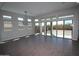 Bright living room with large sliding glass doors leading to the backyard at 21537 W Pierson St, Buckeye, AZ 85396