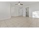 Bedroom featuring tile flooring and a ceiling fan at 2171 S Portland Ave, Gilbert, AZ 85295