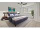 Main bedroom featuring tile flooring and a ceiling fan at 2171 S Portland Ave, Gilbert, AZ 85295