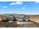 New construction home with two-car garage and mountain views at 23527 W Estes Way, Buckeye, AZ 85326