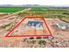 Aerial view of a new single-story house on a large lot at 23527 W Estes Way, Buckeye, AZ 85326