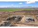 Aerial view of two new houses under construction in a rural setting at 23527 W Estes Way, Buckeye, AZ 85326