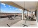 Spacious covered patio, outdoor dining, and fire pit at 23527 W Estes Way, Buckeye, AZ 85326